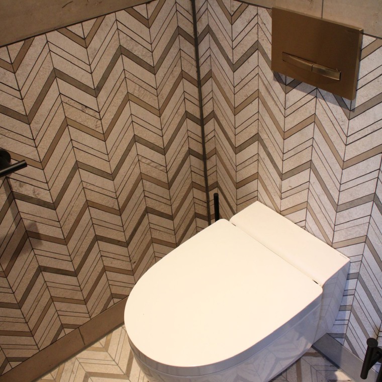 Clapetele de acționare Sigma50 asigură eleganță atemporală. (© Geberit)