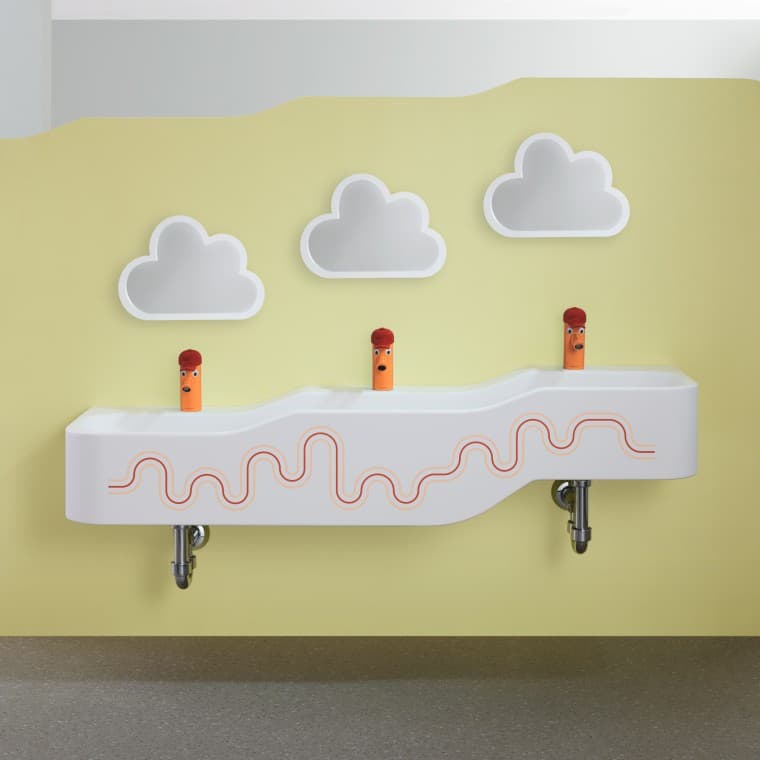 Spaţiu de joacă şi spălare Geberit Bambini în roşu carmin şi portocaliu Spaţiu de joacă şi spălare Geberit Bambini în roşu carmin şi portocaliu